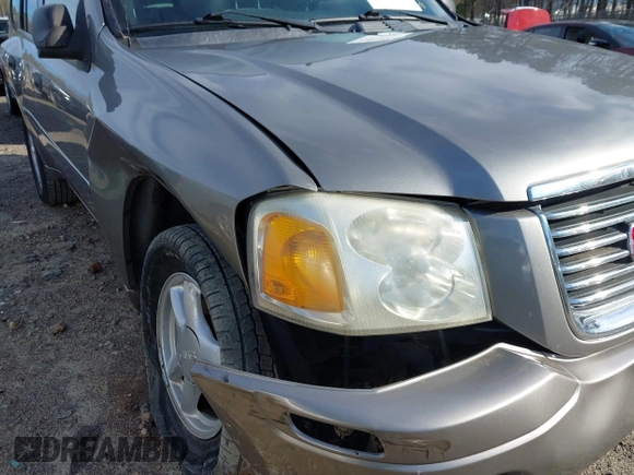 2007 GMC Envoy SLE with VIN 1GKDS13S372241844, listed as a IAAI auction lot 41575443 with 144,726 mi miles. Bid and sale history available at carsss.com. Image 6.