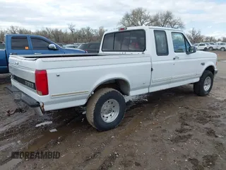 1995 Ford F-150 with VIN 1FTEX14N8SKB20438, listed as a IAAI auction lot 42048210 with 151,107 mi miles. Bid and sale history available at carsss.com. Image 4.