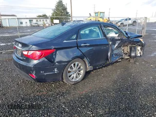2014 Hyundai Sonata SE with VIN 5NPEC4AC5EH856675, listed as a IAAI auction lot 41785114 with 83,567 mi miles and . Bid and sale history available at DreamBid. Image 4.