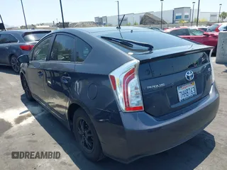 2015 Toyota Prius Four with VIN JTDKN3DUXF0401038, listed as a IAAI auction lot 42461797 with 142,302 mi miles and . Bid and sale history available at DreamBid. Image 3.