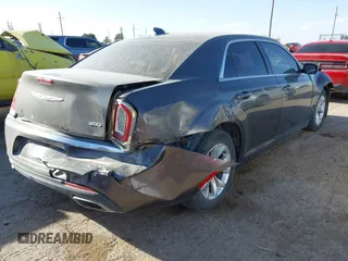 2016 Chrysler 300 Anniversary Edition with VIN 2C3CCAAG0GH206645, listed as a IAAI auction lot 41739990 with 154,516 mi miles and . Bid and sale history available at DreamBid. Image 4.