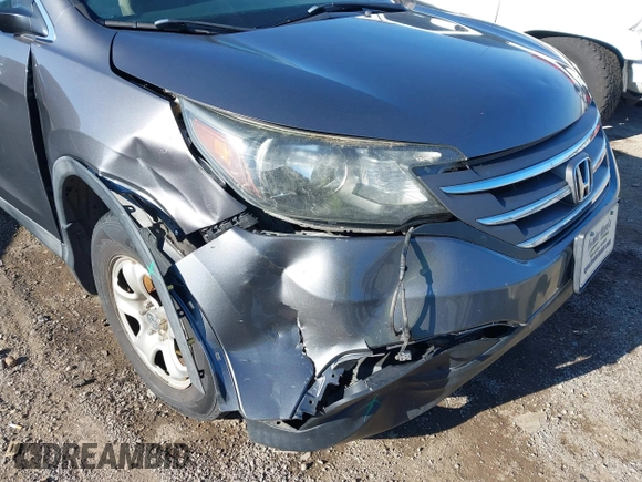 2014 Honda CR-V LX with VIN 2HKRM4H39EH634676, listed as a IAAI auction lot 41233279 with 153,761 mi miles and . Bid and sale history available at carsss.com. Image 6.