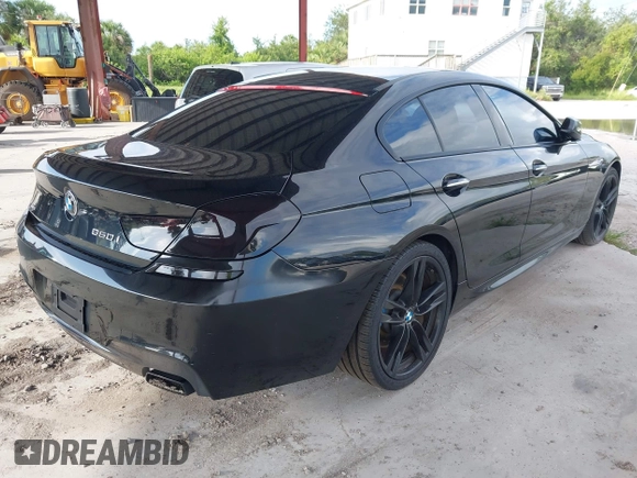 2014 BMW 6 Series 650i z VIN WBA6B2C57ED129681, wystawiony jako IAAI lot #42517803 z przebiegiem 208 644 mil mil oraz . Historia ofert i sprzedaży dostępna na DreamBid. Obrazek 4.