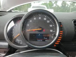 2016 MINI Clubman z VIN WMWLN5C56G2B28065, wystawiony jako Copart lot #54565825 z przebiegiem 129 270 mil mil oraz Szkoda całkowita • Salvage title. Historia ofert i sprzedaży dostępna na DreamBid. Obrazek 9.