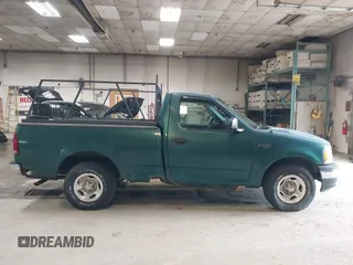 2000 Ford F-150 XL with VIN 2FTZF1722YCA27112, listed as a IAAI auction lot 42687404 with Not provided miles and . Bid and sale history available at DreamBid. Image 14.