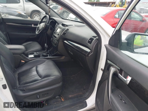 2015 Kia Sorento EX with VIN 5XYKU4A71FG647090, listed as a IAAI auction lot 42100215 with 121,842 mi miles. Bid and sale history available at carsss.com. Image 5.