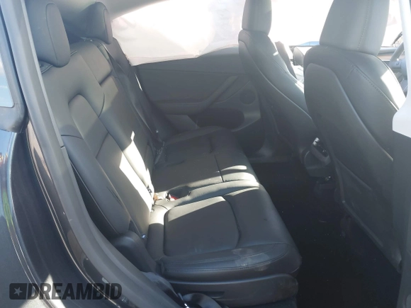 2024 Tesla Model Y Long Range with VIN 7SAYGAEEXRF212415, listed as a IAAI auction lot 41665627 with Not Provided miles and . Bid and sale history available at DreamBid. Image 7.