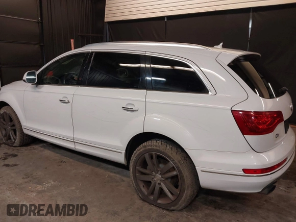 2013 Audi Q7 Premium Plus with VIN WA1LGAFE1DD009705, listed as a IAAI auction lot 41390712 with 99,649 mi miles and . Bid and sale history available at DreamBid. Image 6.