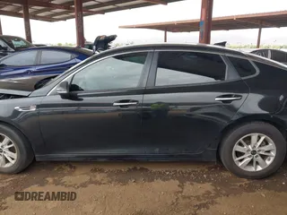 2016 Kia Optima LX with VIN KNAGT4L32G5111503, listed as a IAAI auction lot 42011975 with 114,476 mi miles. Bid and sale history available at carsss.com. Image 14.