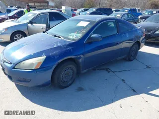 2003 Honda Accord Cpe LX with VIN 1HGCM72283A003916, listed as a IAAI auction lot 41682644 with 334,182 mi miles. Bid and sale history available at carsss.com. Image 2.