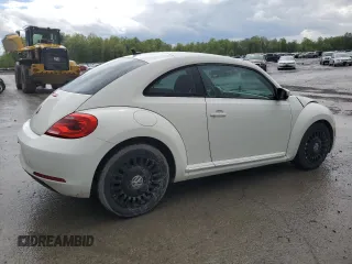 2014 Volkswagen Beetle 2.5L w/Sun with VIN 3VWJP7AT9EM602575, listed as a Copart auction lot 55383965 with 130,525 mi miles and Salvage Title. Bid and sale history available at DreamBid. Image 3.