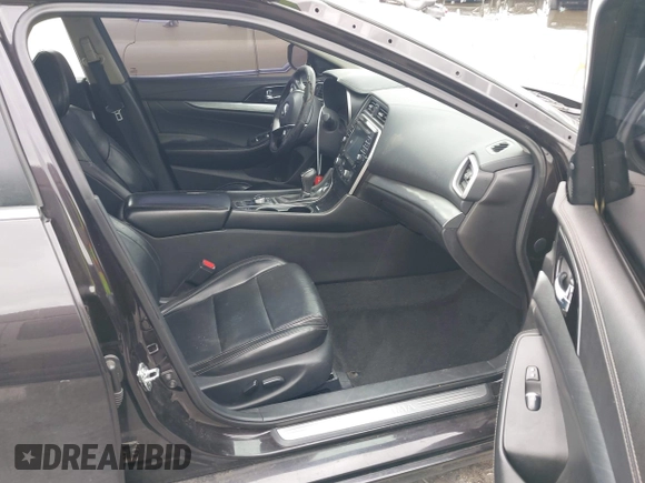 2016 Nissan Maxima SV z VIN 1N4AA6AP9GC388991, wystawiony jako IAAI lot #42110609 z przebiegiem 139 467 mil mil oraz . Historia ofert i sprzedaży dostępna na DreamBid. Obrazek 5.