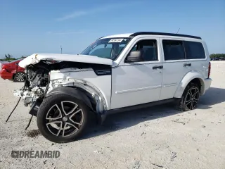 2011 Dodge Nitro SE z VIN 1D4PT2GK3BW520236, wystawiony jako Copart lot #64354194 z przebiegiem Nie podano mil oraz Szkody całkowita. Historia ofert i sprzedaży dostępna na DreamBid. Obrazek 1.