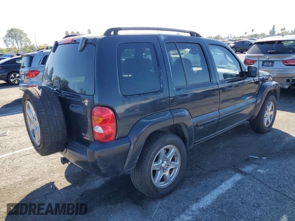2004 Jeep Liberty Limited with VIN 1J4GK58K14W113447, listed as a Copart auction lot 46850935 with 214,554 mi miles and Salvage title. Bid and sale history available at DreamBid. Image 3.