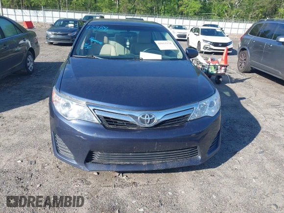 2014 Toyota Camry L with VIN 4T1BF1FK3EU820882, listed as a IAAI auction lot 42012278 with 174,000 mi miles and . Bid and sale history available at DreamBid. Image 13.