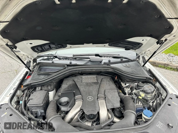 2014 Mercedes-Benz M 550 with VIN 4JGDA7DB0EA386032, listed as a Copart auction lot 61507465 with 131,078 mi miles and Clean title. Bid and sale history available at DreamBid. Image 7.