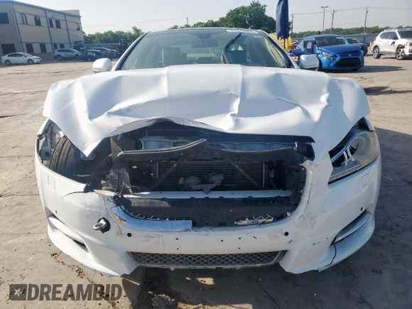 2014 Jaguar XJ Supercharged z VIN SAJWA1GT4EMV60053, wystawiony jako Copart lot #57643005 z przebiegiem 48 139 mil mil oraz Szkoda całkowita • Salvage title. Historia ofert i sprzedaży dostępna na DreamBid. Obrazek 5.