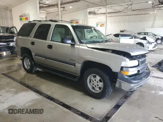 2002 Chevrolet Tahoe LS z VIN 1GNEC13Z82J278601, wystawiony jako Copart lot #59963545 z przebiegiem 149 999 mil mil oraz Szkoda całkowita • Salvage title. Historia ofert i sprzedaży dostępna na DreamBid. Obrazek 4.