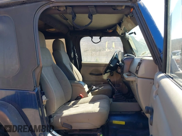2003 Jeep Wrangler Sport with VIN 1J4FA49S03P343285, listed as a IAAI auction lot 41823684 with 201,723 mi miles and . Bid and sale history available at DreamBid. Image 5.