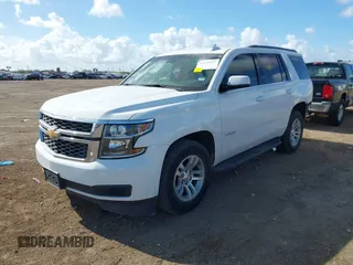 2019 Chevrolet Tahoe LT z VIN 1GNSCBKC0KR393975, wystawiony jako IAAI lot #41129927 z przebiegiem 119 470 mil mil oraz . Historia ofert i sprzedaży dostępna na DreamBid. Obrazek 2.