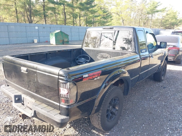 2011 Ford Ranger XLT with VIN 1FTLR4FE9BPB07796, listed as a IAAI auction lot 42128597 with 235,512 mi miles. Bid and sale history available at carsss.com. Image 6.