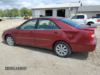 2003 Toyota Camry LE z VIN JTDBF30K530091667, wystawiony jako Copart lot #54576175 z przebiegiem 230 772 mil mil oraz Czysty tytuł • Clean title. Historia ofert i sprzedaży dostępna na DreamBid. Obrazek 2.