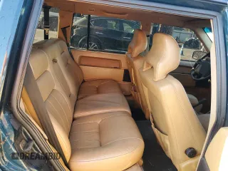 1992 Volvo 960 z VIN YV1KW9510N0005570, wystawiony jako Copart lot #70897964 z przebiegiem 254 533 mil mil oraz Szkody całkowita. Historia ofert i sprzedaży dostępna na DreamBid. Obrazek 10.