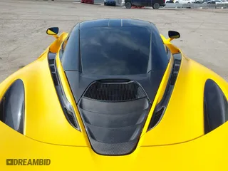 2019 McLaren 720S with VIN SBM14DCAXKW002639, listed as a IAAI auction lot 41707749 with 59,720 mi miles. Bid and sale history available at carsss.com. Image 10.