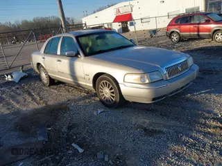 2010 Mercury Grand Marquis LS z VIN 2MEBM7FVXAX627542, wystawiony jako IAAI lot #41769116 z przebiegiem 87 845 mil mil oraz . Historia ofert i sprzedaży dostępna na DreamBid. Obrazek 1.