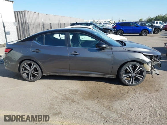 2021 Nissan Sentra SR z VIN 3N1AB8DV0MY290032, wystawiony jako IAAI lot #41819281 z przebiegiem 265 088 mil mil oraz . Historia ofert i sprzedaży dostępna na DreamBid. Obrazek 14.