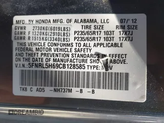 2012 Honda Odyssey EX-L with VIN 5FNRL5H69CB128585, listed as a IAAI auction lot 41695109 with 231,565 mi miles and . Bid and sale history available at carsss.com. Image 9.