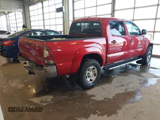 2009 Toyota Tacoma PreRunner with VIN 3TMJU62N19M074316, listed as a IAAI auction lot 41400672 with 94,191 mi miles. Bid and sale history available at carsss.com. Image 4.