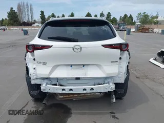 2023 Mazda CX-30 S Carbon Edition with VIN 3MVDMBCM0PM569100, listed as a IAAI auction lot 41978191 with 20,470 mi miles and . Bid and sale history available at DreamBid. Image 17.