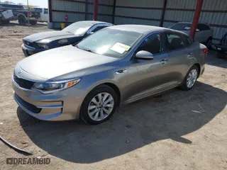 2018 Kia Optima S with VIN 5XXGT4L31JG267408, listed as a IAAI auction lot 41780014 with 111,940 mi miles. Bid and sale history available at carsss.com. Image 2.