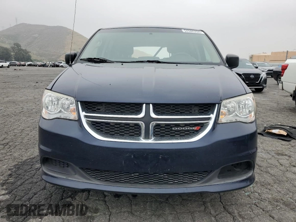 2015 Dodge Grand Caravan SE with VIN 2C4RDGBG0FR702106, listed as a Copart auction lot 54595205 with 209,319 mi miles and Salvage Title. Bid and sale history available at DreamBid. Image 5.