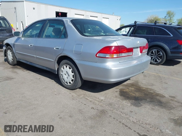 2001 Honda Accord LX with VIN JHMCG66531C014357, listed as a IAAI auction lot 42038445 with 171,864 mi miles and . Bid and sale history available at DreamBid. Image 3.