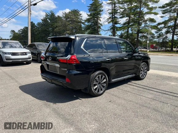 2018 Lexus LX 570 with VIN JTJHY7AX8J4258452, listed as a Copart auction lot 57357365 with 131,556 mi miles and Clean title. Bid and sale history available at DreamBid. Image 4.