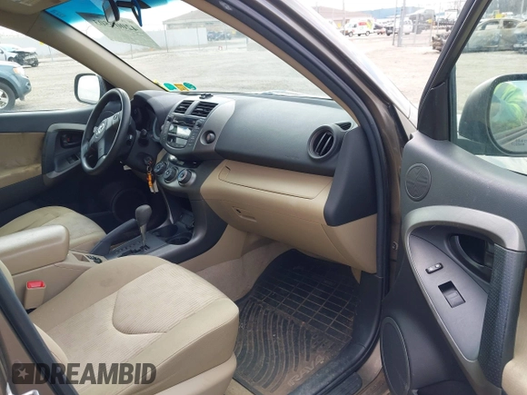 2011 Toyota RAV4 with VIN 2T3BF4DV9BW117899, listed as a IAAI auction lot 42009503 with 211,802 mi miles. Bid and sale history available at carsss.com. Image 5.