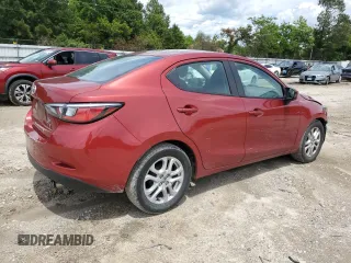 2016 Scion iA z VIN 3MYDLBZV6GY129364, wystawiony jako Copart lot #57217905 z przebiegiem 139 110 mil mil oraz Tytuł czysty. Historia ofert i sprzedaży dostępna na DreamBid. Obrazek 4.