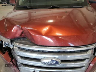 2014 Ford Edge SEL z VIN 2FMDK4JC1EBA68966, wystawiony jako Copart lot #42680905 z przebiegiem 152 433 mil mil oraz Szkoda całkowita • Salvage title. Historia ofert i sprzedaży dostępna na DreamBid. Obrazek 12.