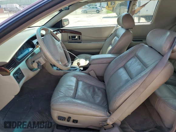 1997 Cadillac Eldorado ESC z VIN 1G6EL12Y5VU614955, wystawiony jako Copart lot #56222345 z przebiegiem 62 030 mil mil oraz Tytuł czysty. Historia ofert i sprzedaży dostępna na DreamBid. Obrazek 7.