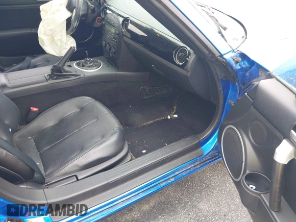 2006 Mazda MX-5 Miata Touring z VIN JM1NC25FX60102209, wystawiony jako IAAI lot #41940771 z przebiegiem 165 003 mil mil oraz . Historia ofert i sprzedaży dostępna na DreamBid. Obrazek 5.