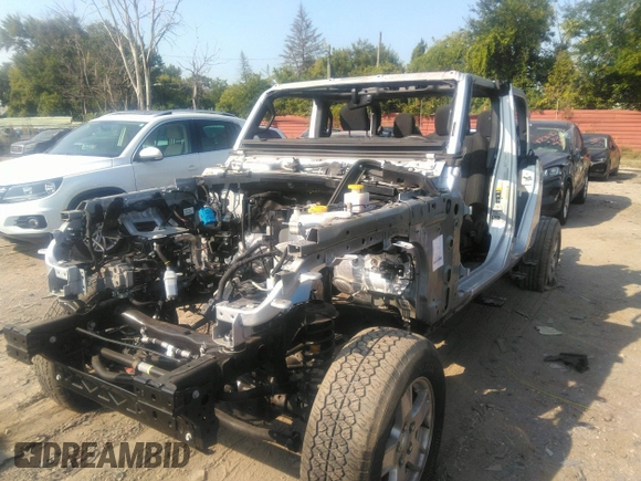 2022 Jeep Gladiator Willys with VIN 1C6HJTAG0NL131004, listed as a IAAI auction lot 40307060 with Not provided miles and . Bid and sale history available at DreamBid. Image 6.
