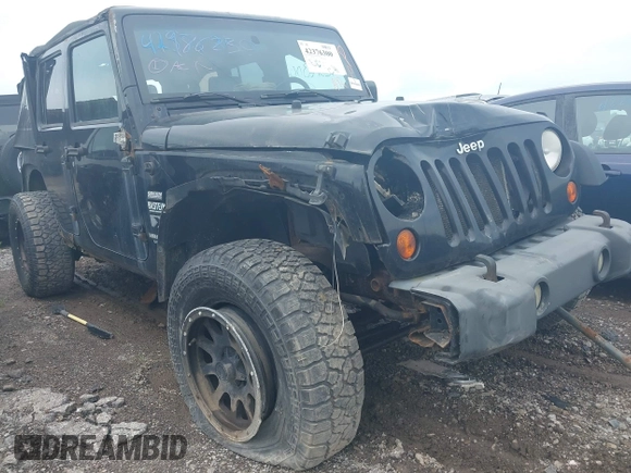 2008 Jeep Wrangler Unlimited X z VIN 1J4GA39138L641138, wystawiony jako IAAI lot #42376300 z przebiegiem 215 026 mil mil oraz . Historia ofert i sprzedaży dostępna na DreamBid. Obrazek 13.