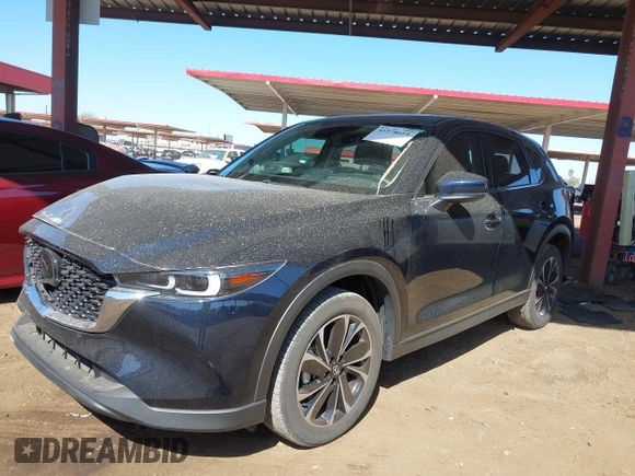 2023 Mazda CX-5 2.5 S Premium Plus Package with VIN JM3KFBEM3P0125736, listed as a IAAI auction lot 41578619 with 18,560 mi miles. Bid and sale history available at carsss.com. Image 17.