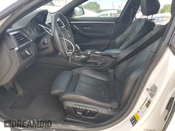 2015 BMW 4 Series 428i xDrive with VIN WBA4A7C53FD415066, listed as a Copart auction lot 61880545 with 130,874 mi miles and Salvage title. Bid and sale history available at DreamBid. Image 7.