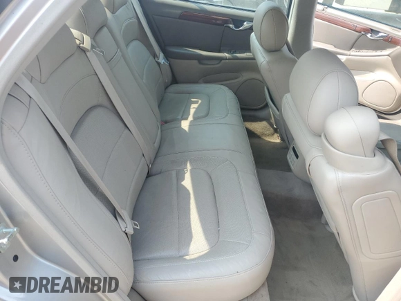 2005 Cadillac DeVille z VIN 1G6KD54Y85U187078, wystawiony jako Copart lot #58547715 z przebiegiem 95 905 mil mil oraz Szkoda całkowita • Salvage title. Historia ofert i sprzedaży dostępna na DreamBid. Obrazek 10.