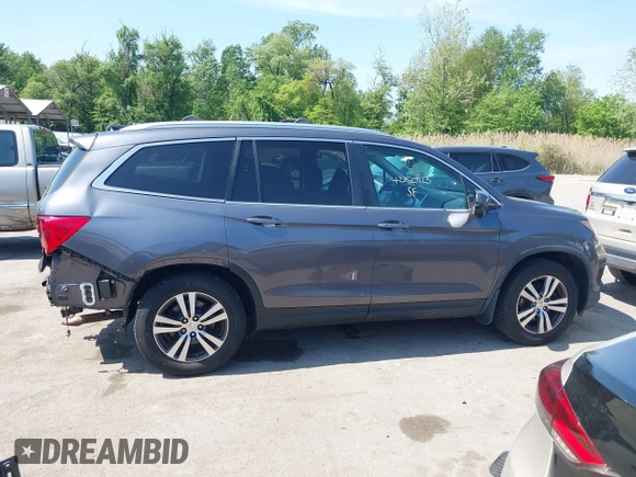 2016 Honda Pilot EX-L with VIN 5FNYF6H54GB083139, listed as a IAAI auction lot 42150923 with 213,009 mi miles and . Bid and sale history available at DreamBid. Image 14.