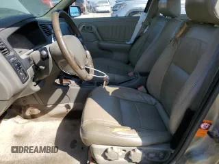 2000 Infiniti G20 Luxury z VIN JNKCP11A5YT311938, wystawiony jako Copart lot #48509185 z przebiegiem 186 595 mil mil oraz Szkoda całkowita • Salvage title. Historia ofert i sprzedaży dostępna na DreamBid. Obrazek 7.