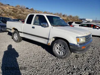 1995 Toyota T100 SR5 with VIN JT4VD12F1S0004904, listed as a Copart auction lot 75796804 with 182,011 mi miles and Salvage Title. Bid and sale history available at DreamBid. Image 4.